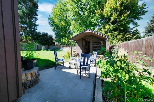 view of patio featuring an outdoor structure