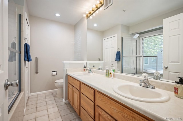 23612 Pondview Pl Unit A, Golden, CO 80401 - full bath featuring double vanity, tile patterned floors, and recessed lighting