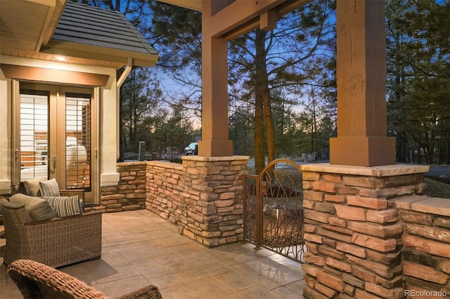 view of patio / terrace with a gate