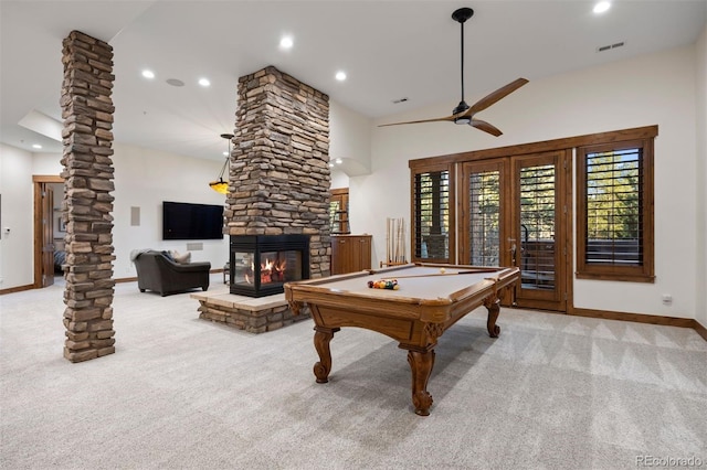 game room with carpet, visible vents, a fireplace, and ornate columns