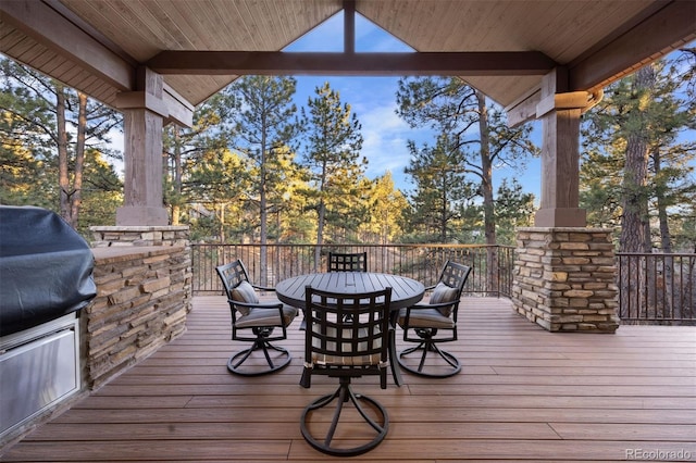 deck featuring outdoor dining area