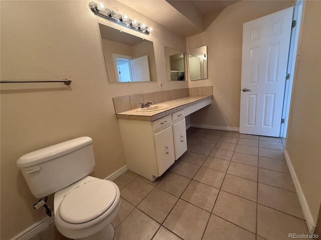 7695 E Quincy Ave Unit 207, Denver, CO 80237 - bathroom featuring vanity and tile patterned flooring