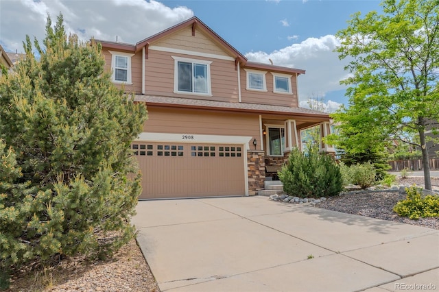 2908 Open Sky Way, Castle Rock, CO 80109 - craftsman house featuring a garage, concrete driveway, stone siding, and covered porch