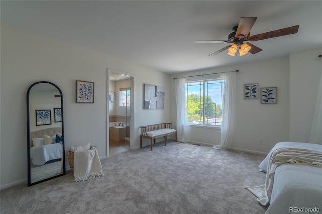 2908 Open Sky Way, Castle Rock, CO 80109 - carpeted bedroom with ensuite bathroom and ceiling fan