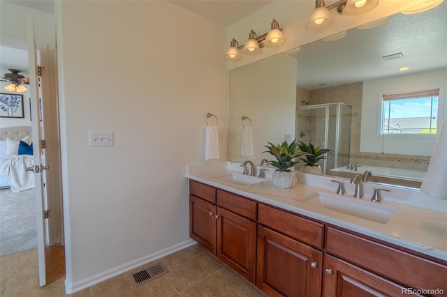 2908 Open Sky Way, Castle Rock, CO 80109 - ensuite bathroom with double vanity, a shower stall, a bath, tile patterned floors, and ceiling fan