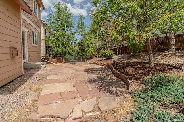 2908 Open Sky Way, Castle Rock, CO 80109 - fenced backyard featuring a patio area and a wall mounted AC