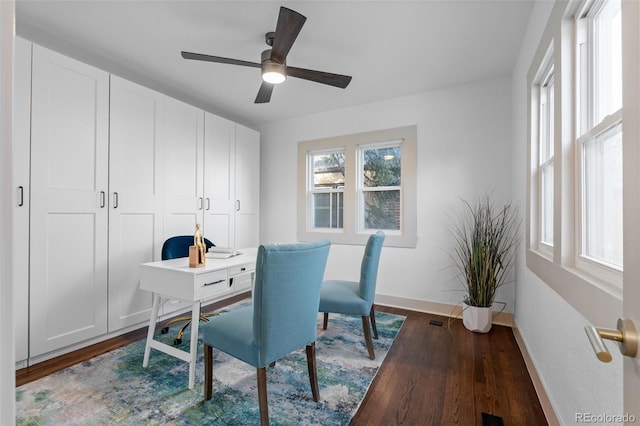 office featuring ceiling fan and dark hardwood / wood-style flooring