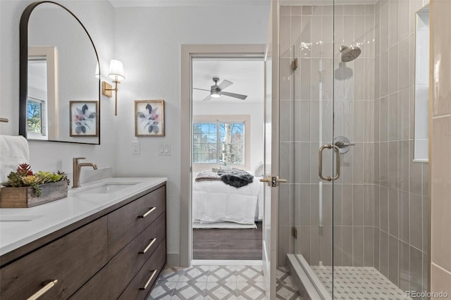 bathroom featuring vanity and a shower with shower door