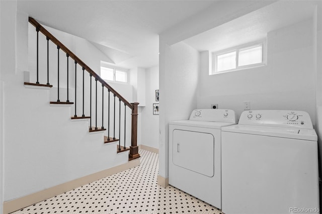 laundry room with independent washer and dryer