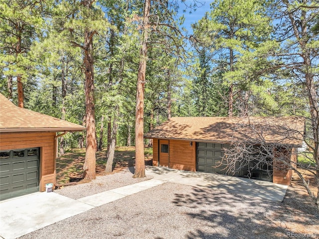 8782 S Ault Ln, Morrison, CO 80465 - garage featuring driveway