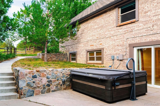 17053 E Jamison Ave, Centennial, CO 80016 - view of patio / terrace featuring a hot tub