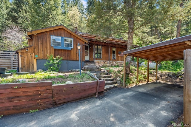 41 Silver Spruce, Boulder, CO 80302 - view of front of house featuring a carport and board and batten siding