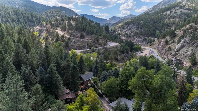 41 Silver Spruce, Boulder, CO 80302 - aerial view of property and surrounding area featuring a forest and mountains