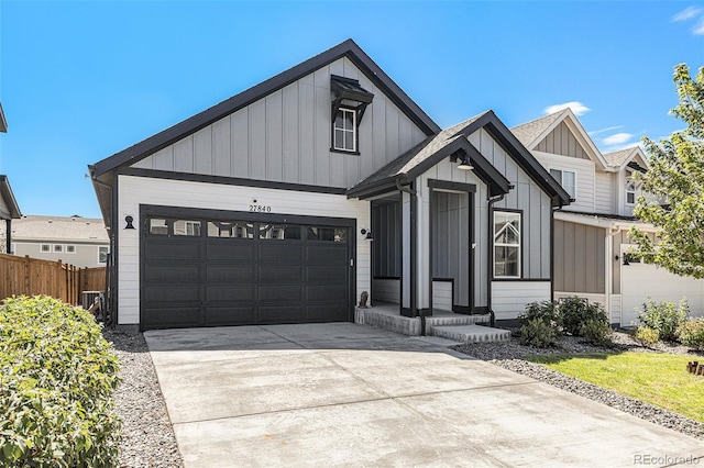 modern farmhouse style home featuring a garage