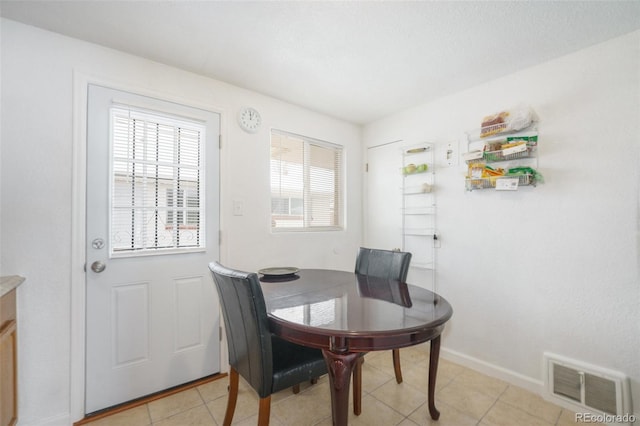 view of tiled dining space