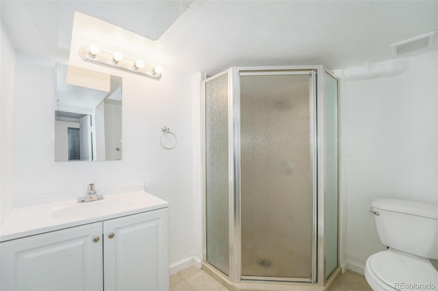 bathroom with walk in shower, vanity, a textured ceiling, and toilet