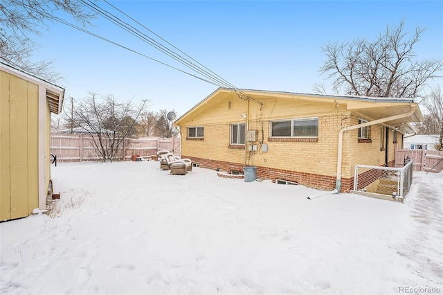 view of snow covered house