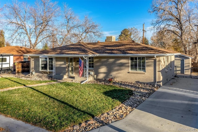5500 Holland Dr, Arvada, CO 80002 - single story home with brick siding and an outdoor structure