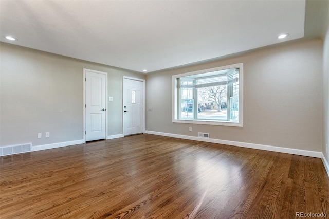 5500 Holland Dr, Arvada, CO 80002 - spare room featuring baseboards, wood finished floors, and recessed lighting