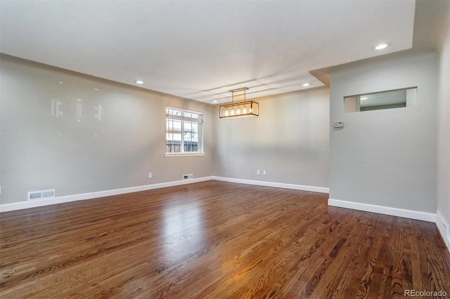 5500 Holland Dr, Arvada, CO 80002 - spare room featuring recessed lighting, wood finished floors, and baseboards
