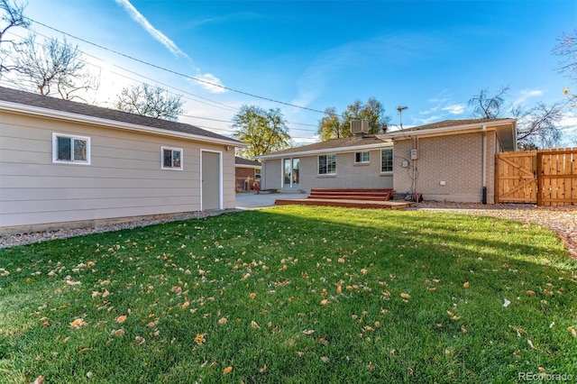 5500 Holland Dr, Arvada, CO 80002 - back of house with a patio, cooling unit, and a gate