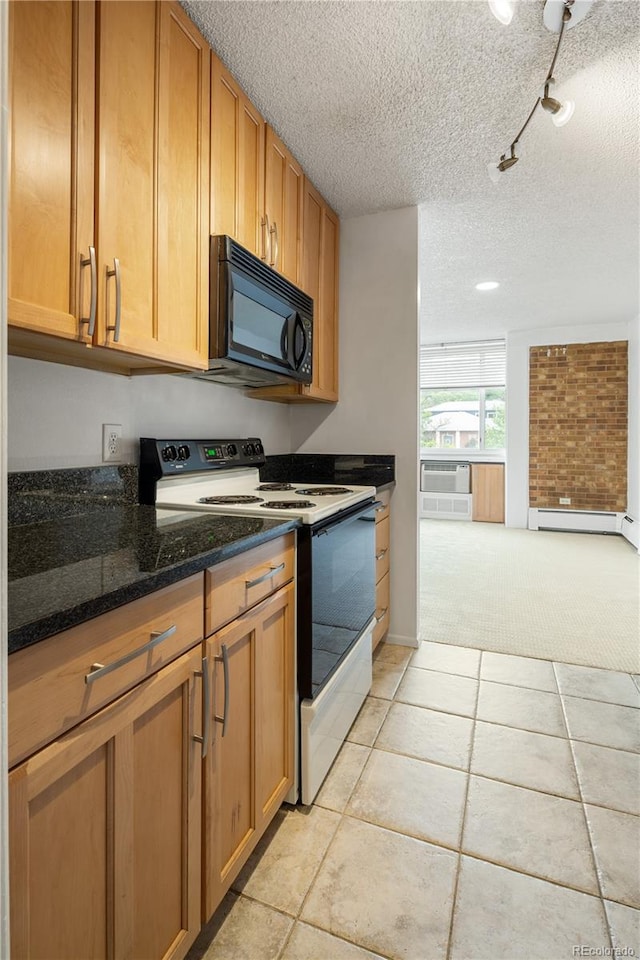 850 20th St Unit 201, Boulder, CO 80302 - kitchen with black microwave, electric stove, a baseboard heating unit, light tile patterned floors, and a textured ceiling