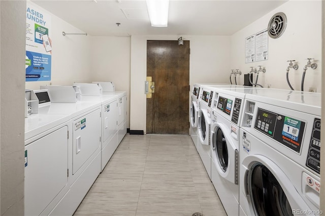 850 20th St Unit 201, Boulder, CO 80302 - community laundry room featuring washing machine and clothes dryer
