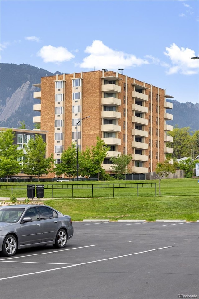 850 20th St Unit 201, Boulder, CO 80302 - view of property featuring a mountain view and uncovered parking