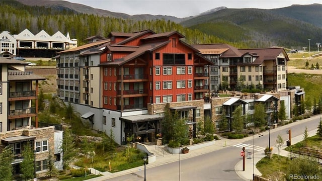 view of building exterior with a mountain view