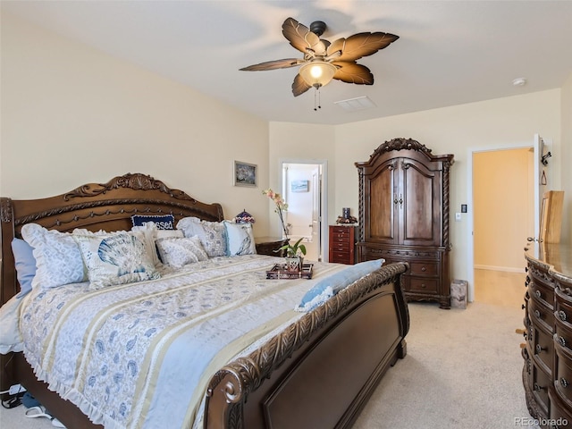 bedroom featuring light carpet and ceiling fan