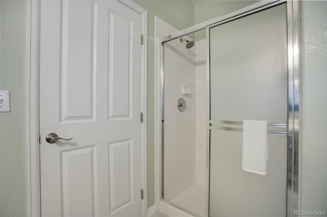 bathroom featuring walk in shower