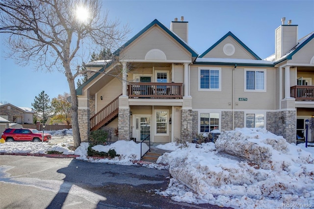 view of front of home with a balcony