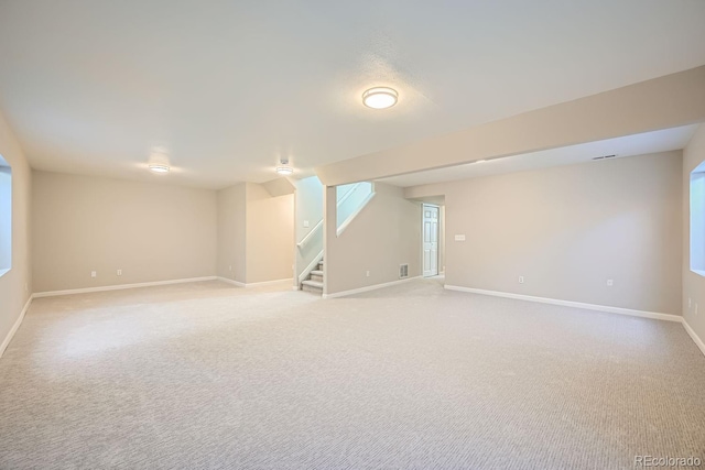 basement with light carpet