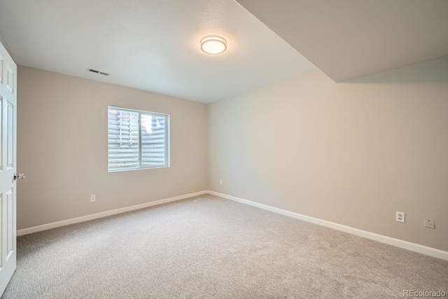 view of carpeted spare room