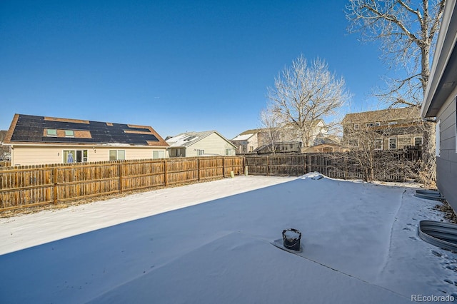 view of yard covered in snow