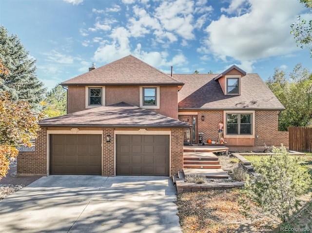 front facade with a garage