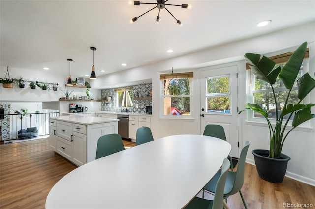 dining area with light wood-type flooring