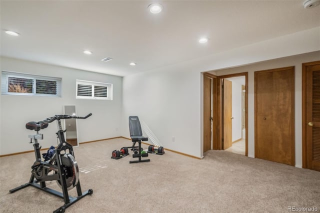 workout area with light carpet