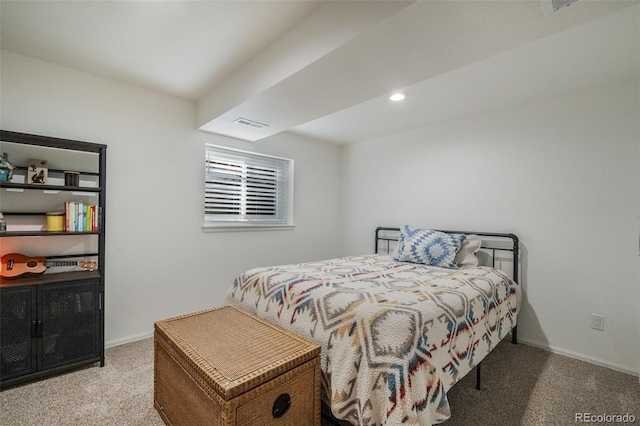 bedroom featuring light carpet