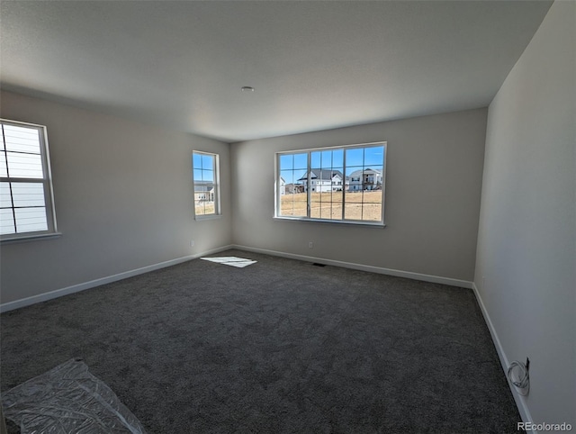 view of carpeted spare room