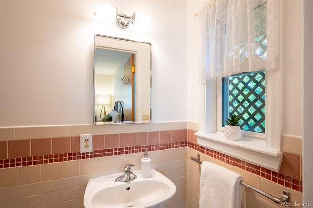 2744 S Newton Way, Denver, CO 80236 - bathroom featuring a sink and tile walls