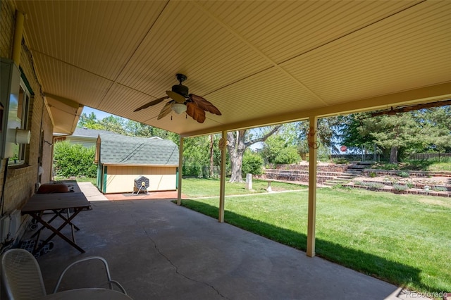 2744 S Newton Way, Denver, CO 80236 - view of patio featuring a ceiling fan and an outdoor structure