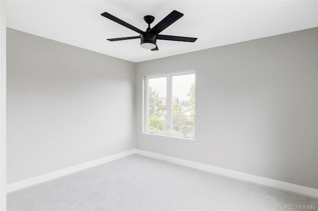 1543 Glencoe St, Denver, CO 80220 - unfurnished room featuring light carpet, baseboards, and ceiling fan