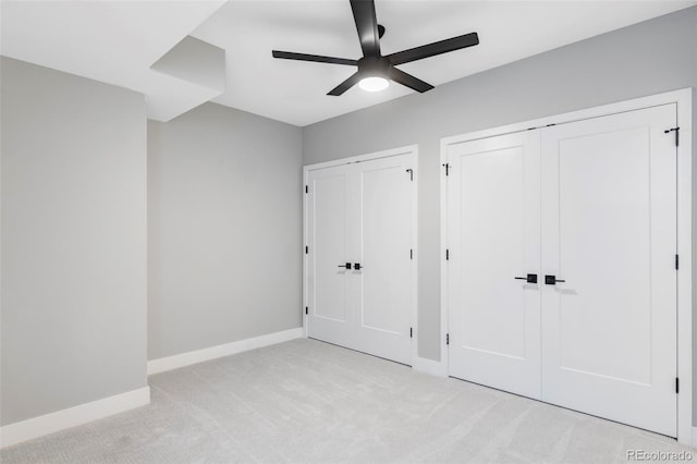 1543 Glencoe St, Denver, CO 80220 - unfurnished bedroom featuring carpet, two closets, baseboards, and a ceiling fan