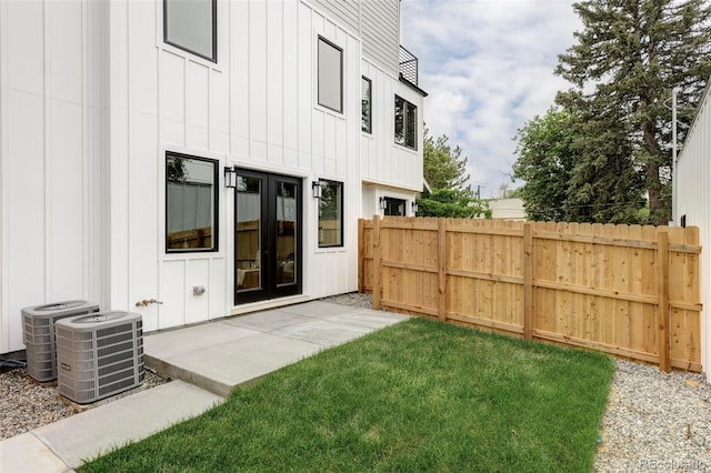 1543 Glencoe St, Denver, CO 80220 - view of yard with central AC unit and french doors