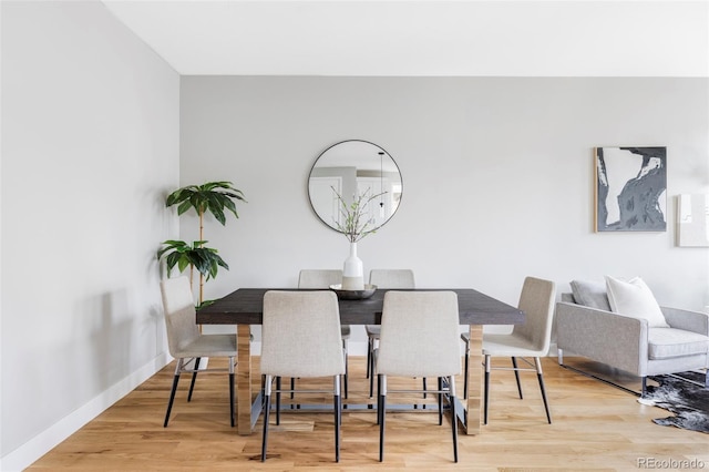 1543 Glencoe St, Denver, CO 80220 - dining area featuring light wood-type flooring and baseboards