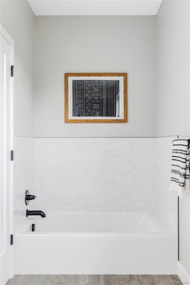 1543 Glencoe St, Denver, CO 80220 - bathroom with a bath and tile patterned floors