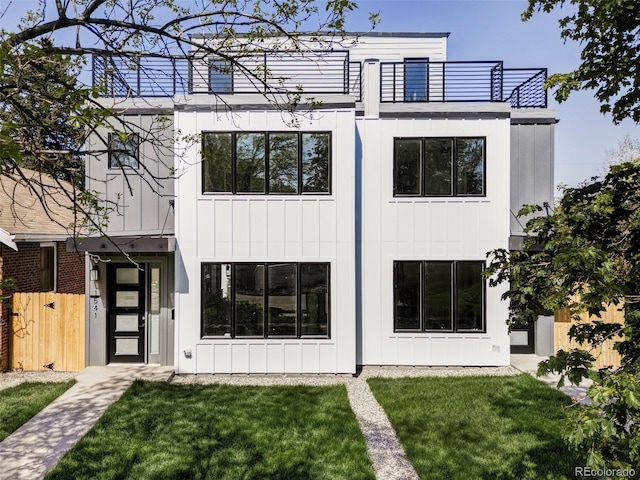 1543 Glencoe St, Denver, CO 80220 - rear view of property with a balcony, board and batten siding, and a gate
