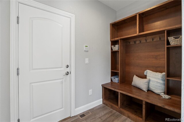 6877 Northstar Ct, Castle Rock, CO 80108 - mudroom with baseboards and wood finished floors