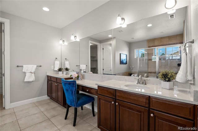 6877 Northstar Ct, Castle Rock, CO 80108 - bathroom with vanity, a shower stall, tile patterned floors, and recessed lighting